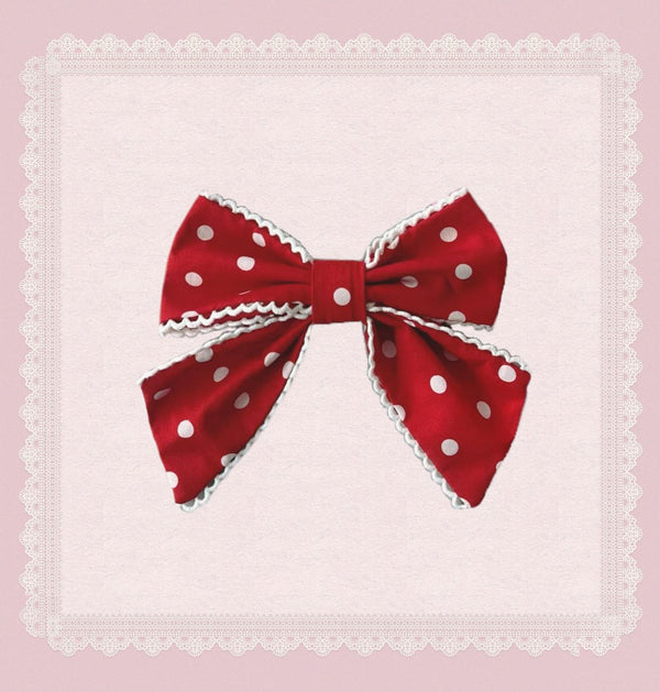 Red-and-white polka-dot Lolita accessories with lace and ruffles.