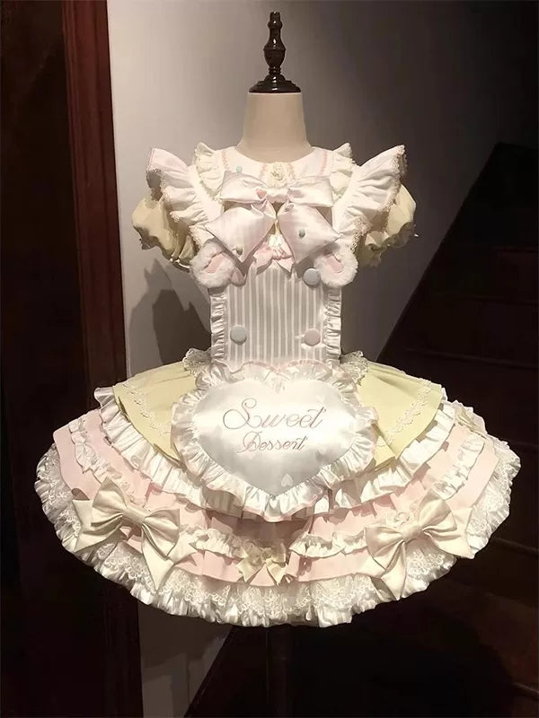 Creamy yellow-and-pink Sweet Dessert OP dress with apron and bow