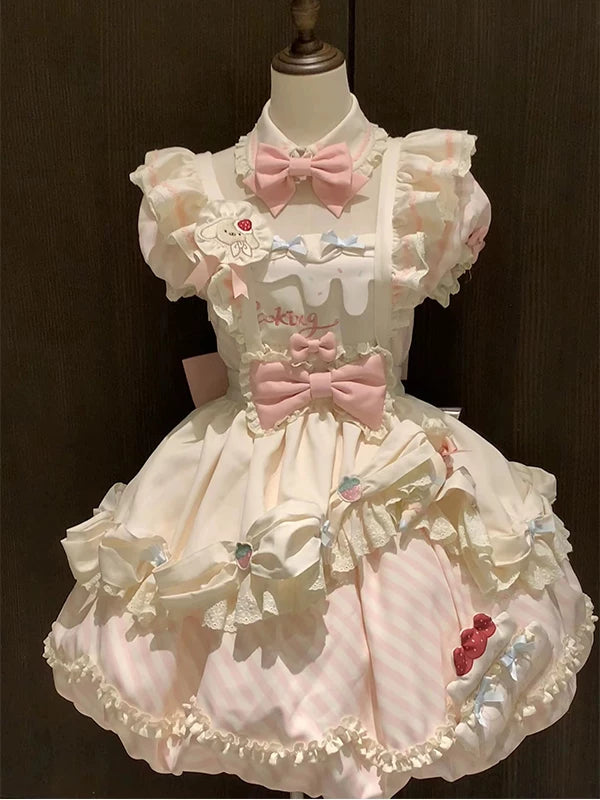 Pink-and-ivory ruffled Lolita skirt set displayed on a mannequin, front and back.
