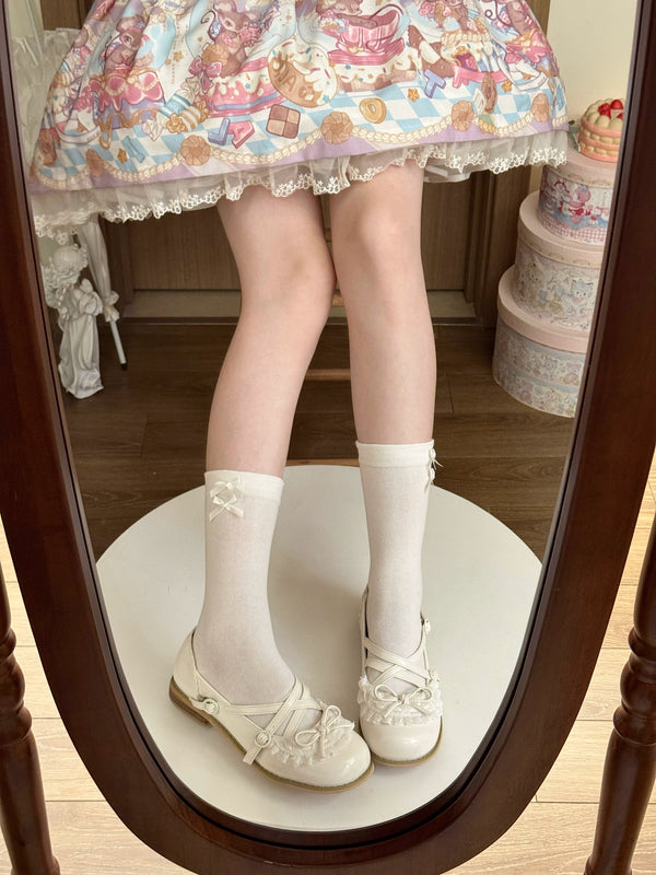 Fantasy Doll white mid-calf socks with small lavender bows styled with a pastel Lolita outfit.