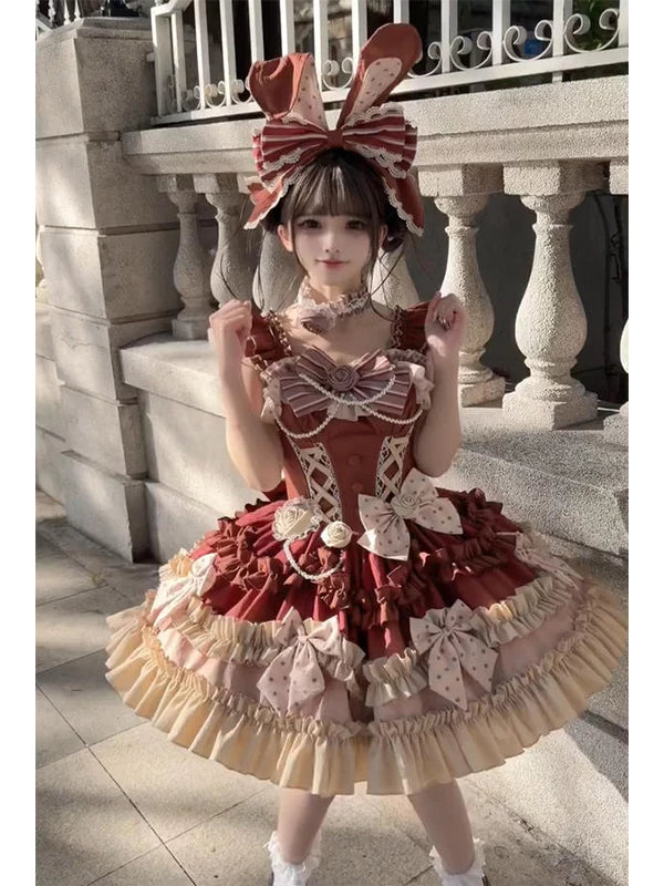 Chocolate brown ruffled JSK dress with bow headwear shown on a model.