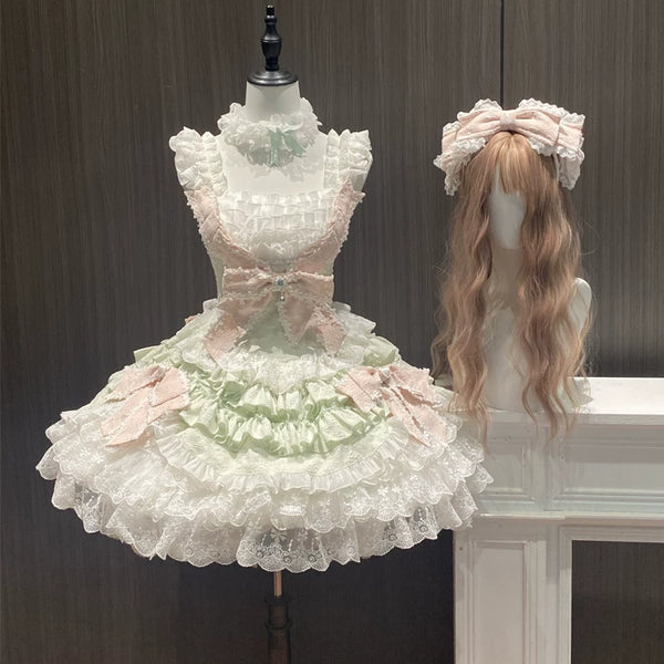 Pastel tiered Lolita skirt with lace ruffles and ribbon details on a mannequin.