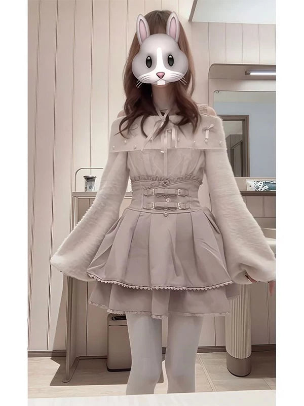 Pale neutral Lolita Fashion set with bow top, fluffy sleeves, and high-waisted skirt