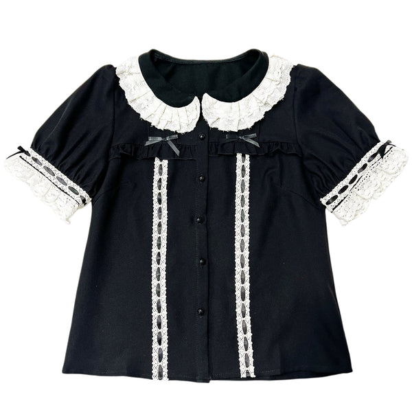 Black short-sleeve shirt with white lace collar, cuffs and front trim