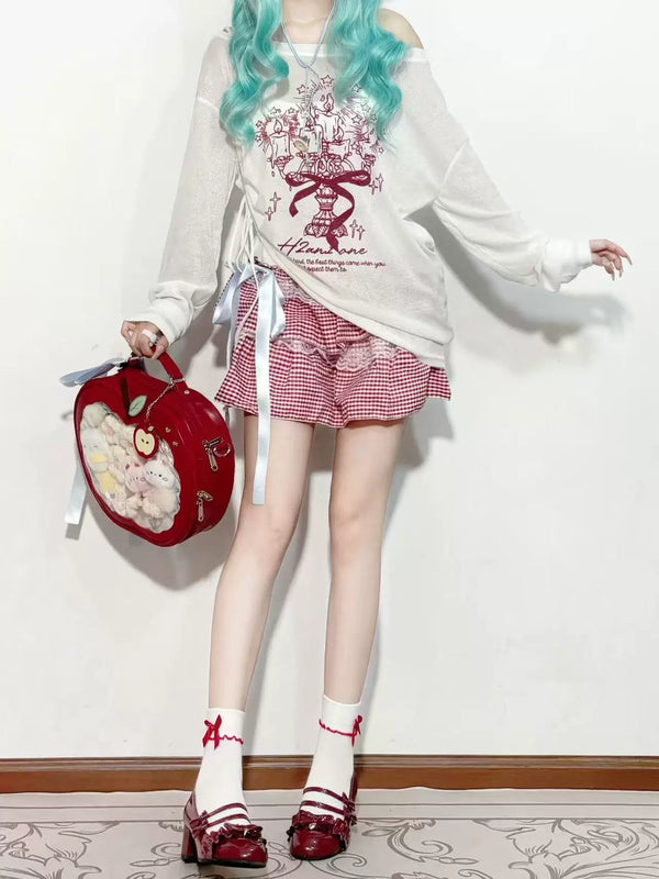 Fantasy Doll white mid-calf socks with red trim and bows styled with red shoes.
