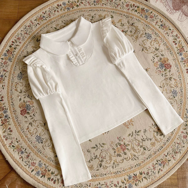 White inner-layer blouse with puffed Juliet sleeves