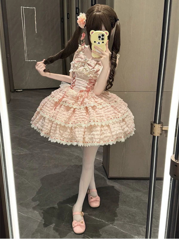 Pink Creamy JSK dress with tiered ruffles and ribbon bows