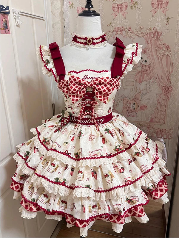 Cream and red strawberry print JSK dress with layered lace on a mannequin