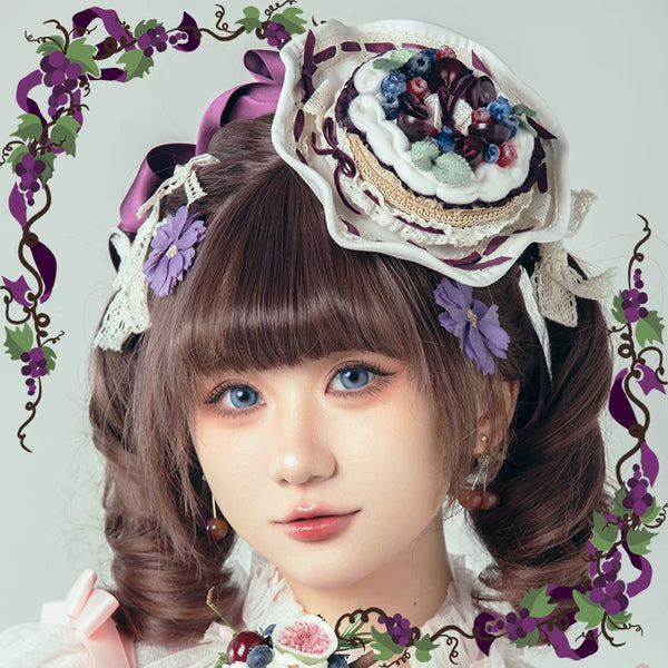 Fruit-tart inspired purple and cream headpiece with berries and grape motifs