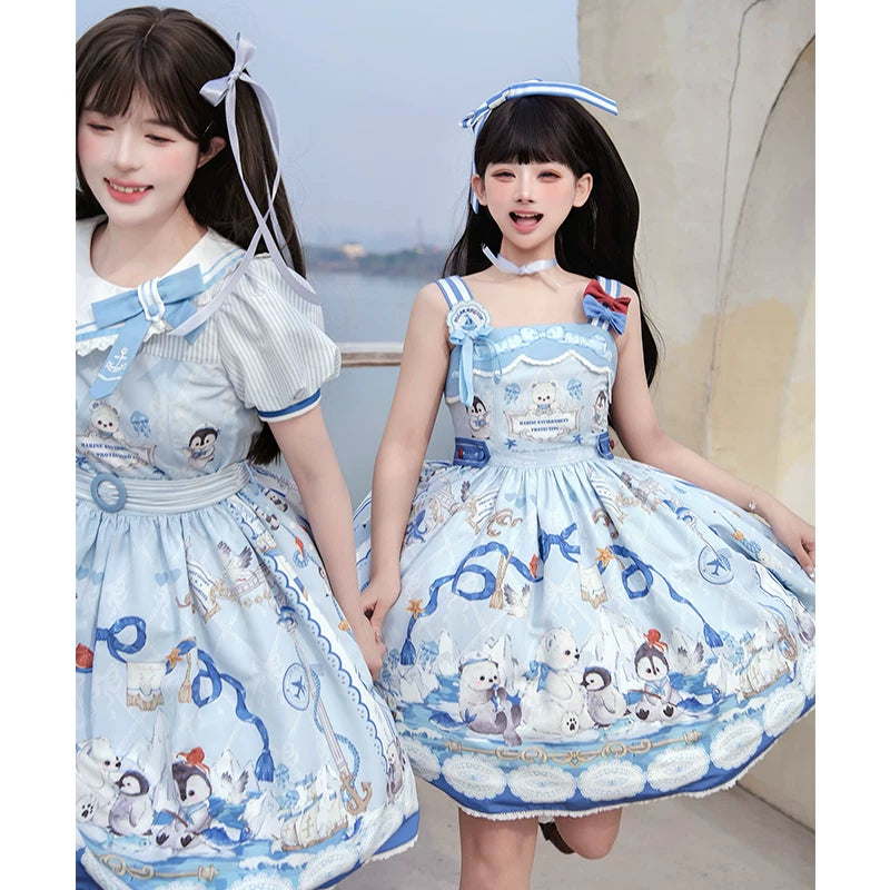 Inmorelli Penguin Navy navy-and-white penguin dress styled on models