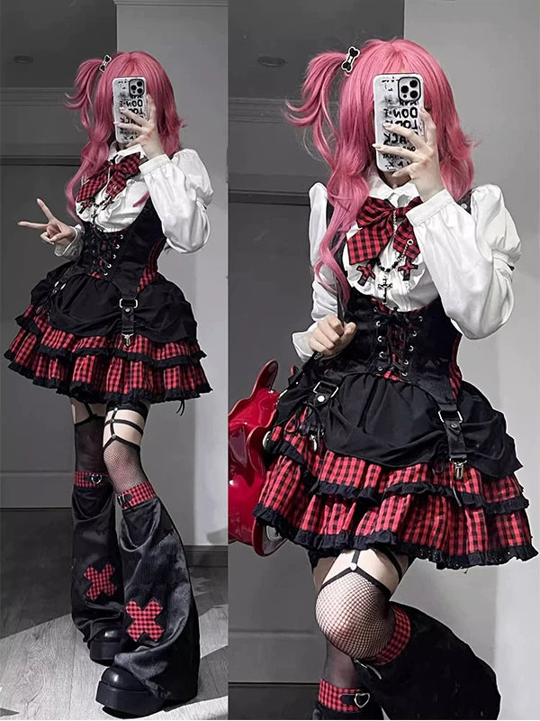 Model wearing a black-and-red plaid Lolita set with a corset-style vest, layered skirt and leg covers.