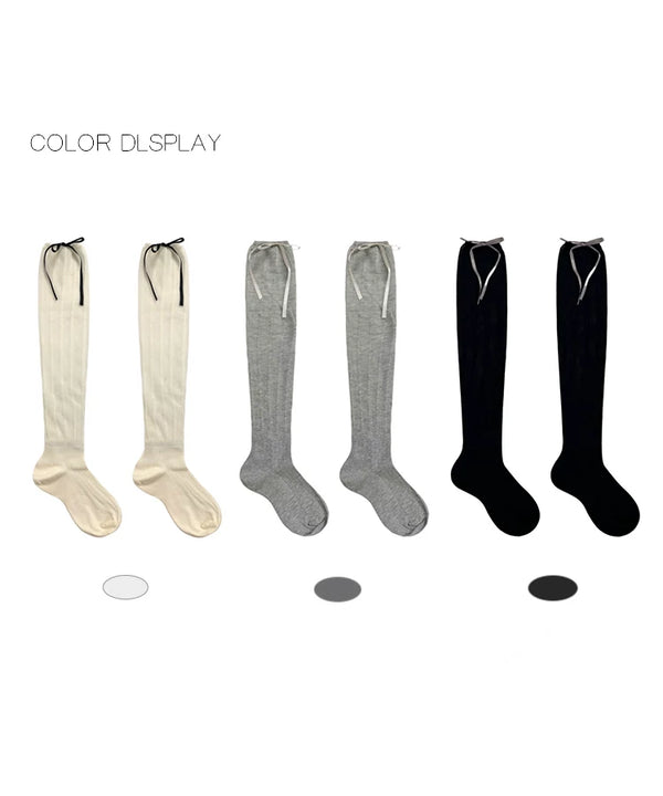 Off-white ruched mesh calf socks with black ribbon ties