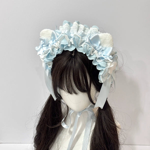 Blue and pink Cat Tart cat-ear hairbands shown on dark-haired mannequins