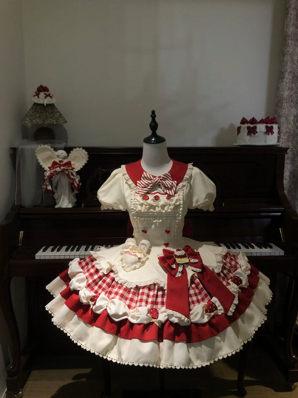 Red and cream OP dress with layered ruffles, bows and dessert details