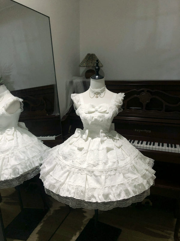 White Sweet Lolita JSK displayed on mannequin showing full tiered skirt and lace details