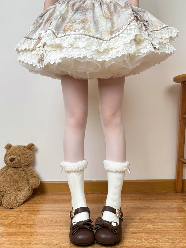 Chubby Bear Tales white lamb-fleece slouch socks with fluffy ribbon cuffs styled with brown Mary Jane shoes