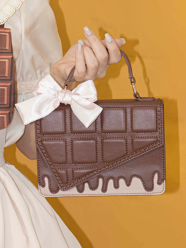 Coffee square handbag with chocolate-grid front, cream drip trim and pink bow