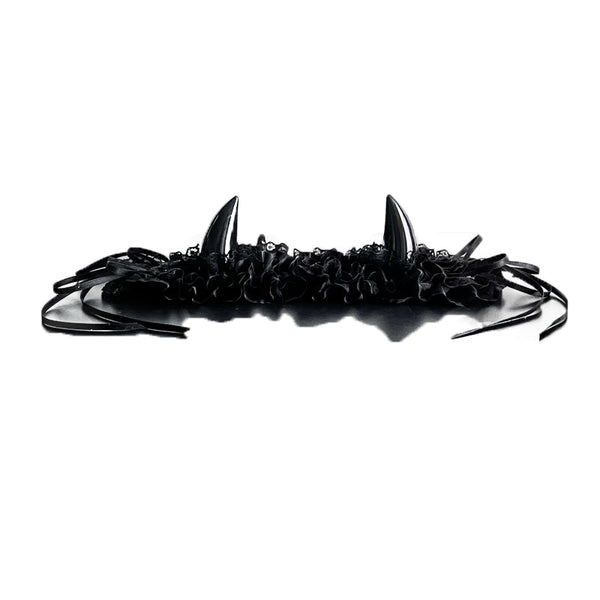 Black ruffled lace devil-horn hairband with rose accents and trailing ribbons.