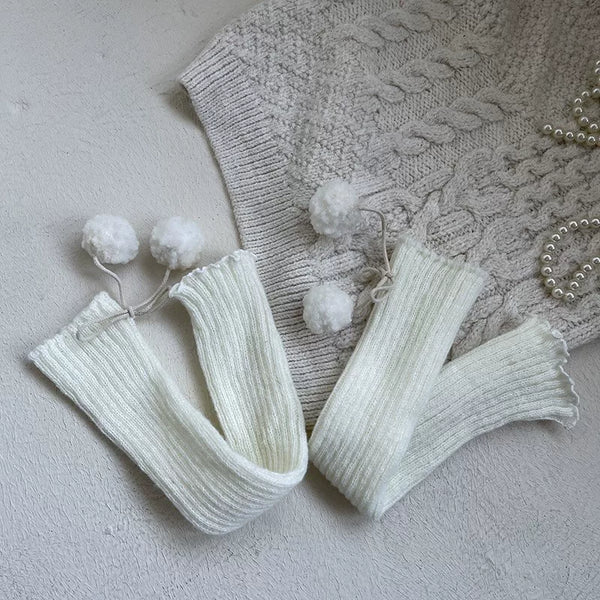 White curly sock covers with attached rabbit figures and white platform shoes