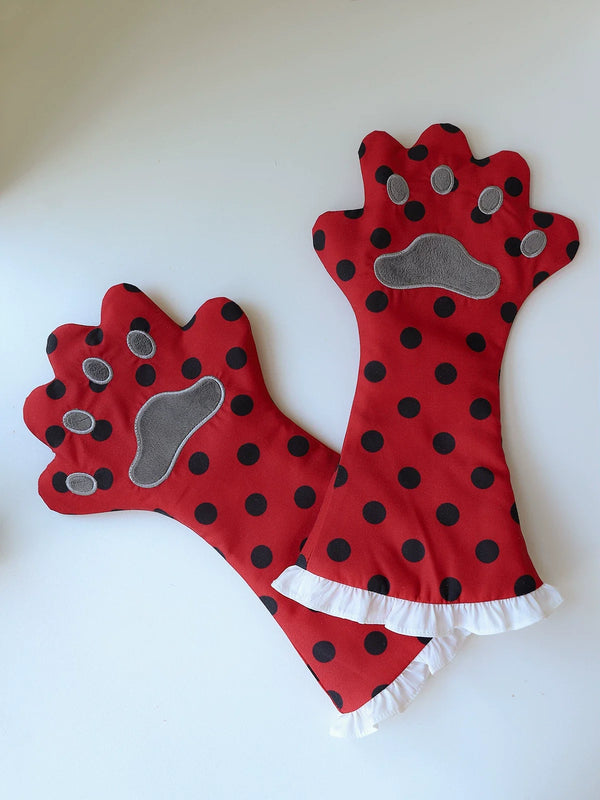 Red polka-dot cat paw gloves and apron with white ruffle trim