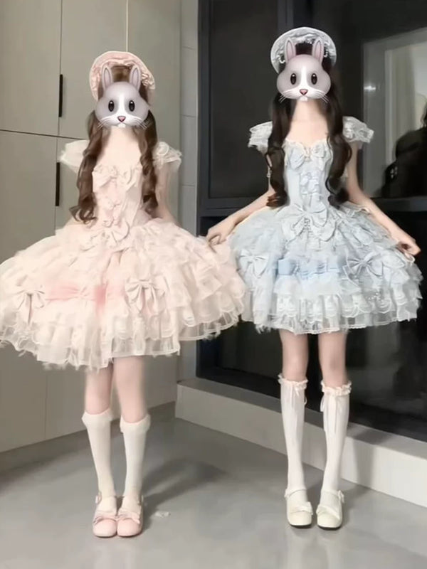 Pink and blue swan-inspired JSK dresses with layered skirts styled on two models