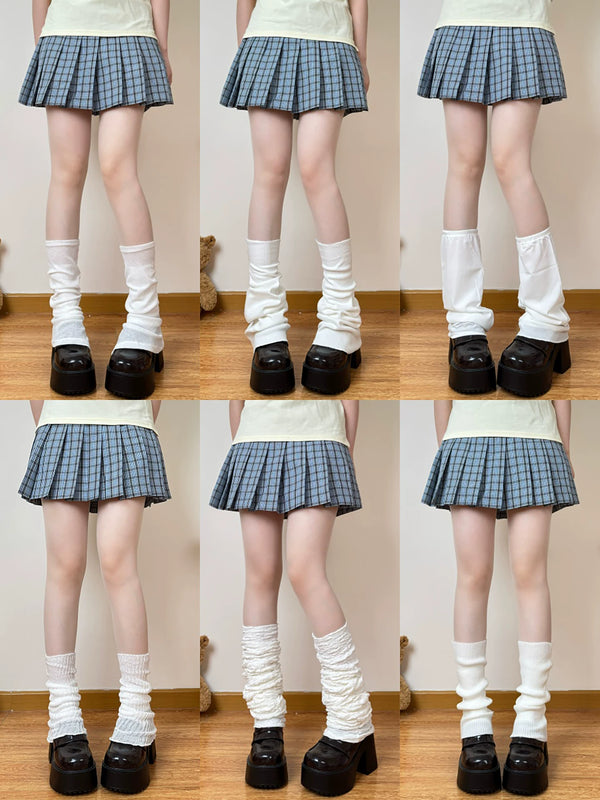 Chubby Bear Tales white gathered sock covers styled with a blue plaid skirt and black platform shoes
