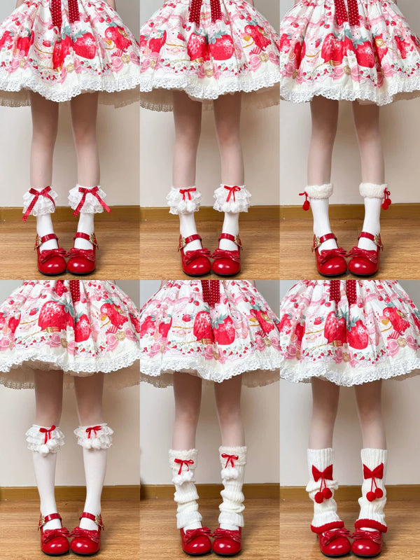 Red-bow white socks with lace trim styled with red Mary Jane shoes