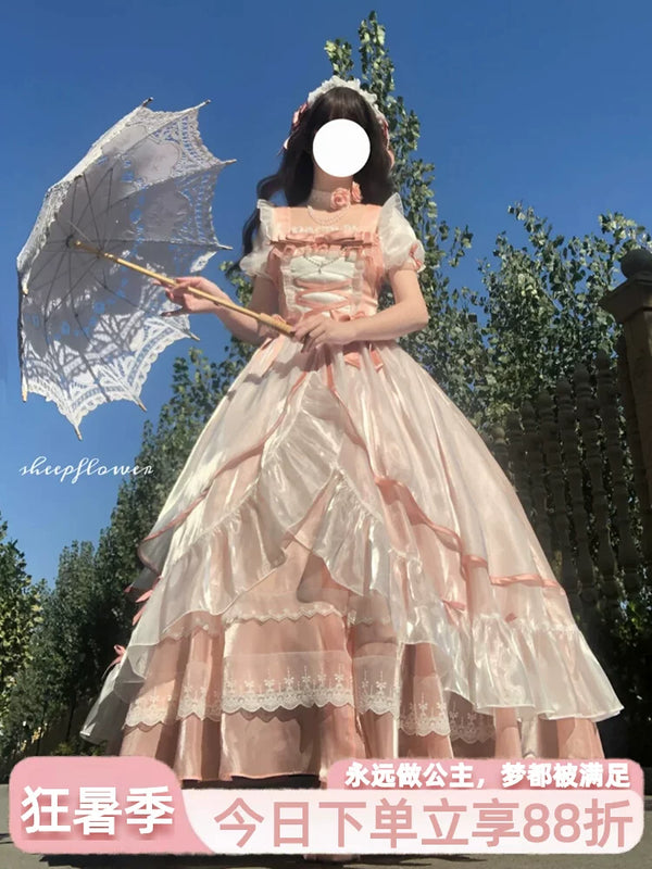 Blush pink sweet lolita ballgown dress with corset front lacing and tiered skirt, front view