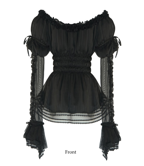 Nololita Dream in Dream black bateau-neck blouse with gathered sleeves and ruffle trim.