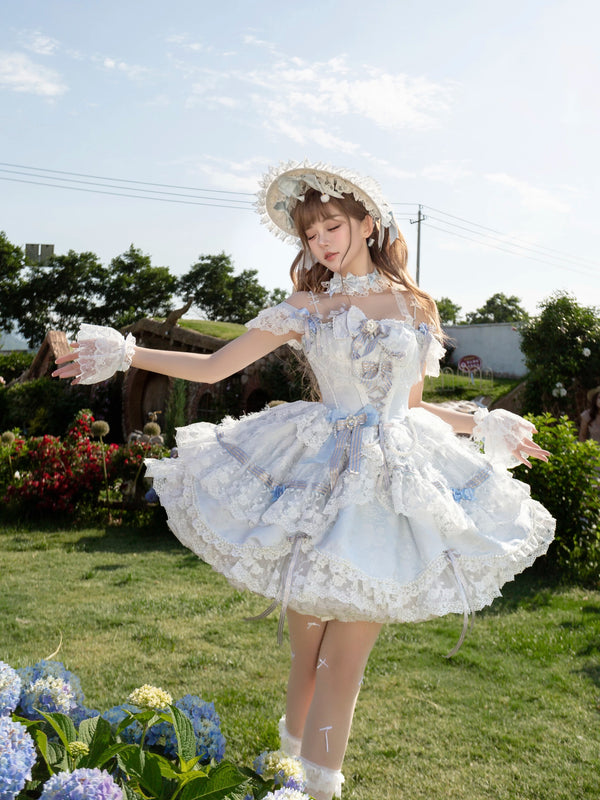 Pale pink balletcore Lolita JSK with off-shoulder lace trim and tiered skirt