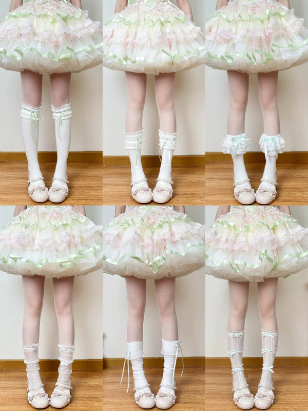 Green-and-white socks and legwear options with bows, lace and layered finishes.