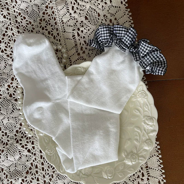 Sock Noble check-pattern over-the-knee socks with ruffle tops and a fluffy bunny leg ring
