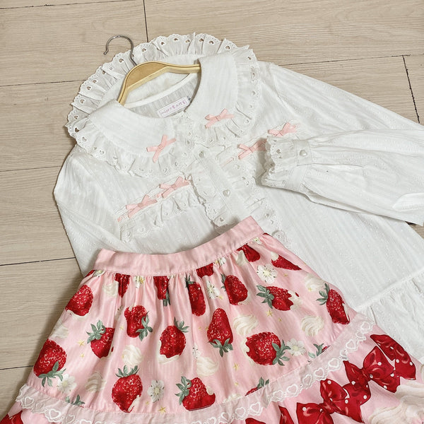 Black Sweet Lolita blouse with a doll collar and puff sleeves
