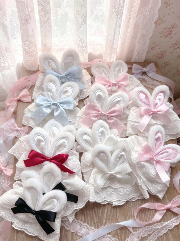 Lace sleeve cuffs with bunny-ear details and ribbon bows shown in white and pink.