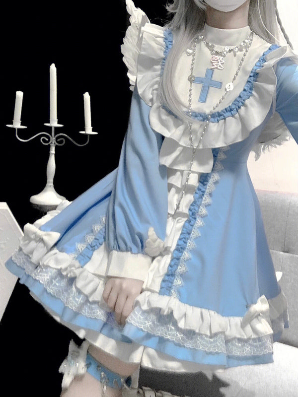Blue and white one-piece dress with lace ruffles and puff sleeves