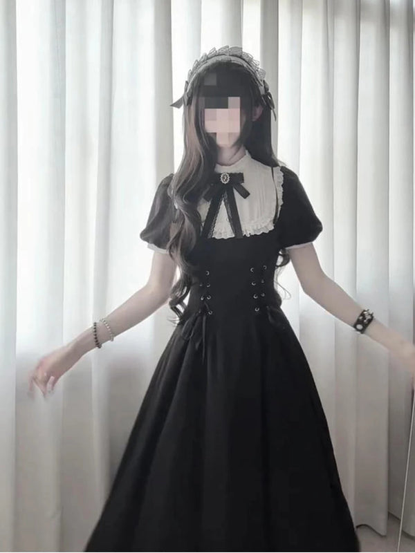 Black-and-white Gothic OP dress with puff sleeves, white lace collar and front lace-up panels.