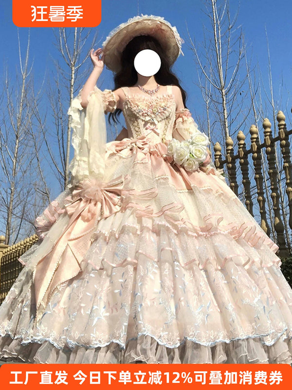 Pink Lolita evening gown with off-the-shoulder ruffled sleeves, tiered tulle skirt, and left hip satin bow, styled on model