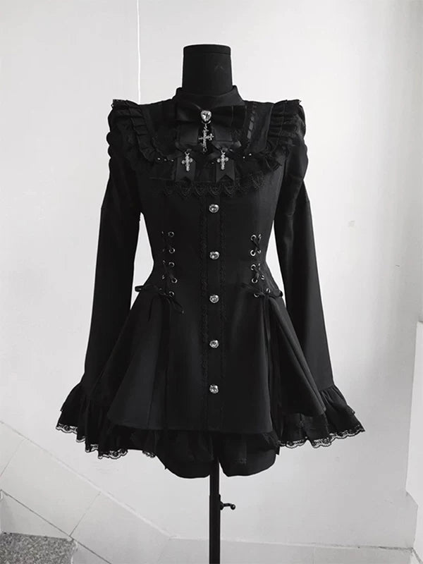 Black lace OP dress with flared cuffs, side lacing and decorative buttons on a mannequin.