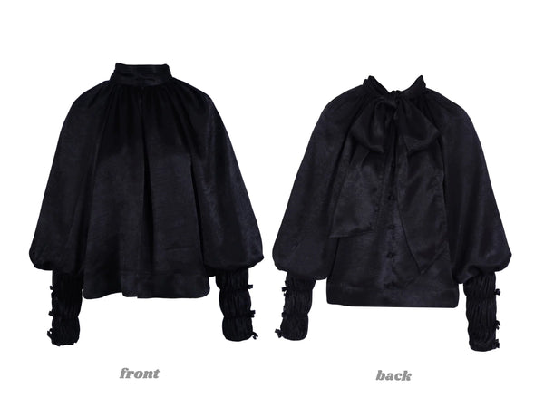 Nololita black spiderweb top displayed front and back