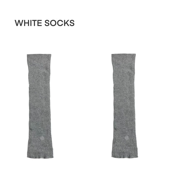 White Socks grey knitted slouch leg warmers with fold-over cuffs styled over white sneakers
