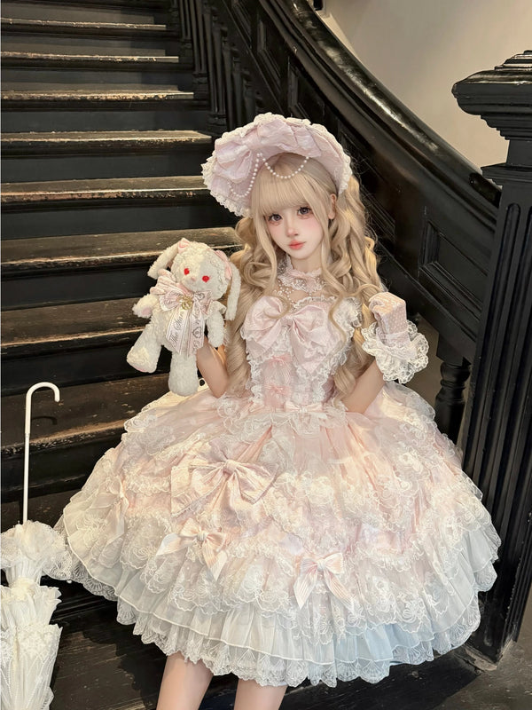 Pale blue Sweet Lolita JSK with lace trim and satin bows displayed on mannequin