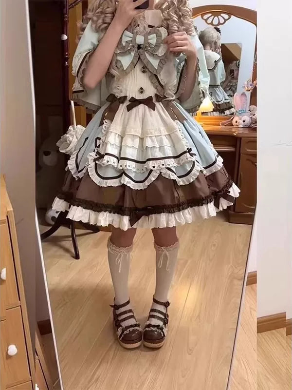 Mint Creamy JSK set with a cape, cream and brown ruffles, and bow details