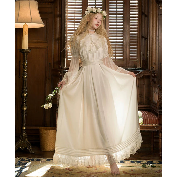 White Edwardian one-piece Lolita dress with wide lace cuffs and long skirt