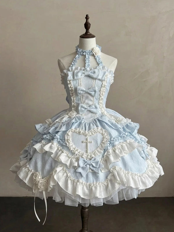 Blue and white ruffled halter Lolita dress on a mannequin with a heart panel and train