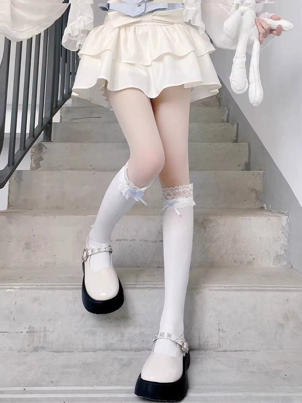 Floral Milk Cat white ribbed calf socks with lace cuffs and blue bows