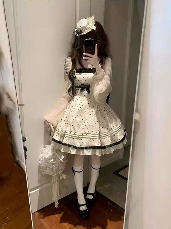Cream-and-black polka-dot Lolita dress and cardigan set in a mirror selfie