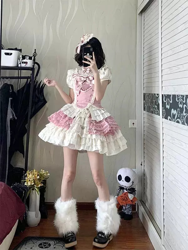 Pink-and-white ruffled blouse and skirt set shown in mirror photos