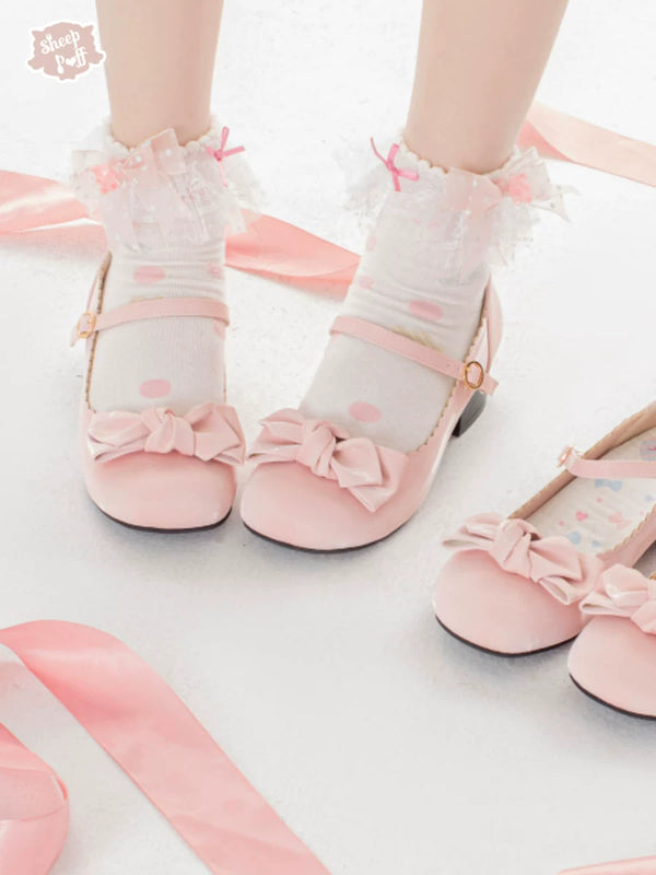 Sheep Puff Satin Lolita shoes with rounded bow and glossy finish, featuring a cute and elegant design for fashion-forward style.