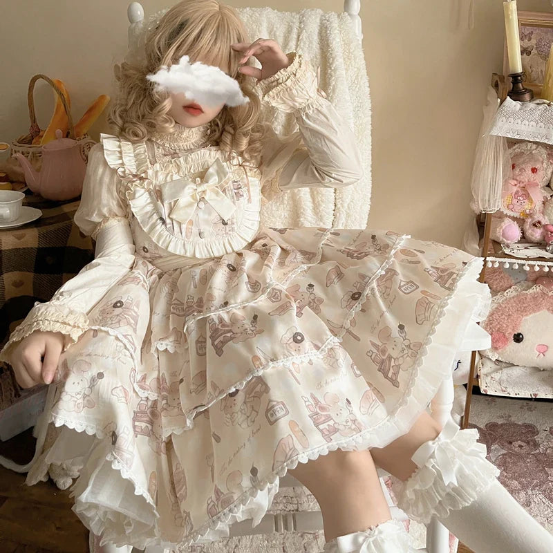JSK NiuNiu Storybook Animals combinado com uma blusa clara e meias de cor clara