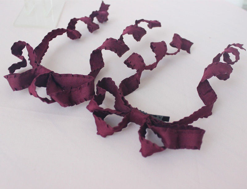 Handmade double ponytail twist hair clip by LolitaFetch, featuring cute Japanese anime-inspired Lolita style hair accessory for girls.